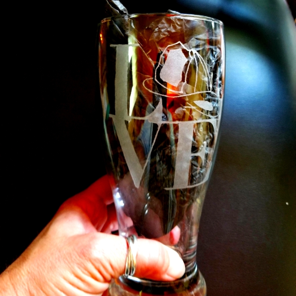 Hand etched glass..